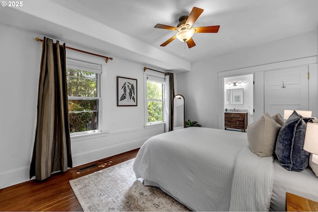 4823 NE 21st Ave, Portland, OR 97211 - bedroom with wood finished floors, ensuite bath, and ceiling fan
