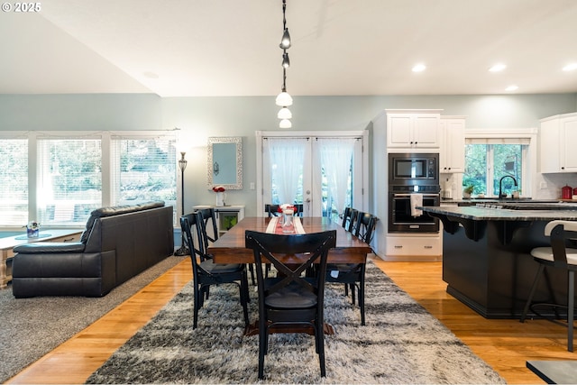 16420 SW Sienna Ln, Beaverton, OR 97007 - dining area with french doors, light wood-type flooring, and recessed lighting