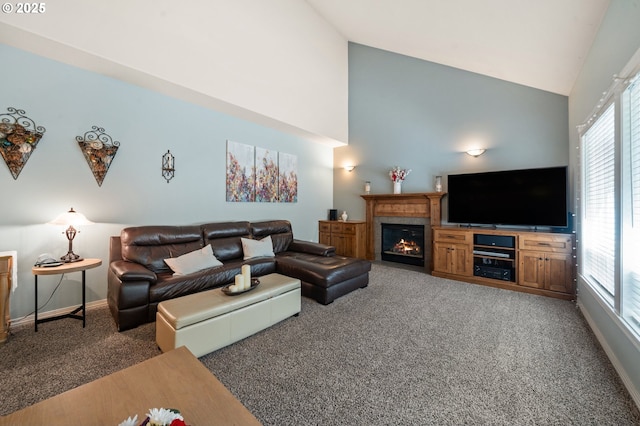 16420 SW Sienna Ln, Beaverton, OR 97007 - living room featuring carpet, a fireplace with flush hearth, and high vaulted ceiling