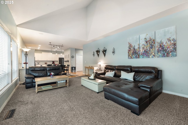 16420 SW Sienna Ln, Beaverton, OR 97007 - living room with carpet floors and high vaulted ceiling