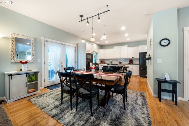 16420 SW Sienna Ln, Beaverton, OR 97007 - dining area with light wood-type flooring and recessed lighting