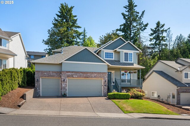 16420 SW Sienna Ln, Beaverton, OR 97007 - craftsman-style home with a garage, covered porch, concrete driveway, a front yard, and brick siding