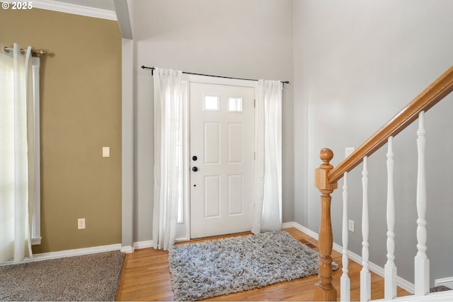 16420 SW Sienna Ln, Beaverton, OR 97007 - foyer featuring light wood-type flooring and stairway