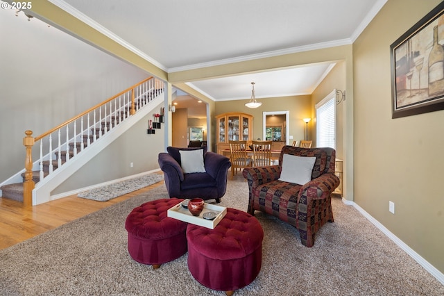 16420 SW Sienna Ln, Beaverton, OR 97007 - living area with stairway, carpet floors, and ornamental molding