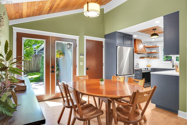 21482 SW 92nd Ct, Tualatin, OR 97062 - dining room with wood ceiling, lofted ceiling, light wood-type flooring, and french doors