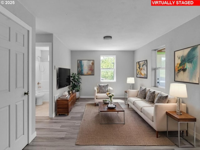 9257 SE Clinton St, Portland, OR 97266 - living area featuring baseboards and wood finished floors