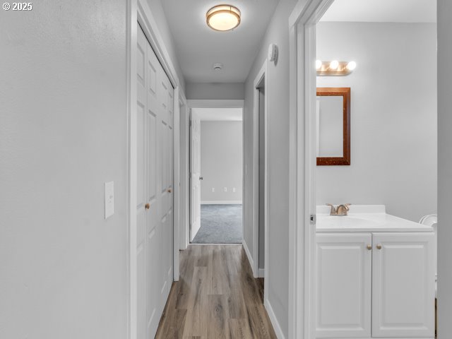 9257 SE Clinton St, Portland, OR 97266 - hall with wood finished floors and baseboards