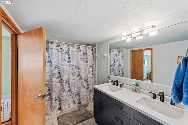 500 State St, North Bend, OR 97459 - bathroom with double vanity, a shower with shower curtain, and a textured ceiling