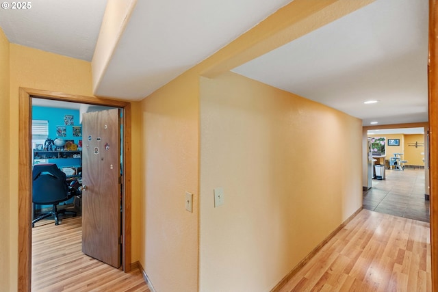 500 State St, North Bend, OR 97459 - hallway with light wood-type flooring and baseboards
