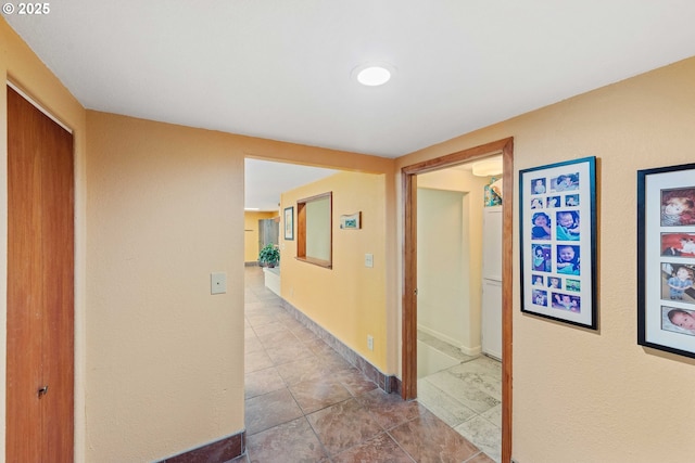 500 State St, North Bend, OR 97459 - hall featuring tile patterned floors and baseboards