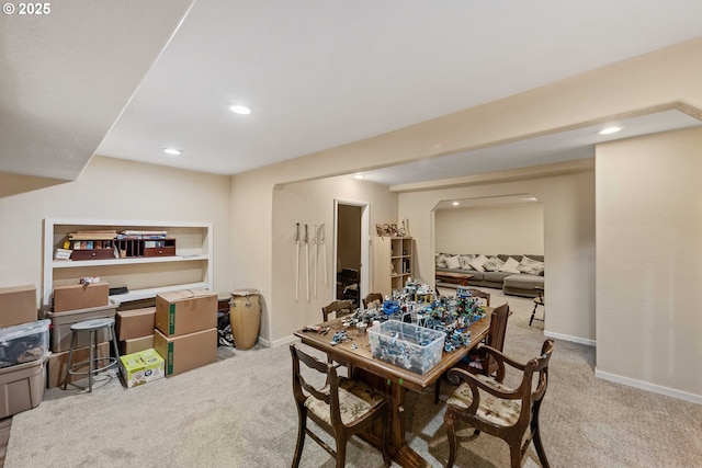 500 State St, North Bend, OR 97459 - dining room with carpet floors, recessed lighting, baseboards, and arched walkways