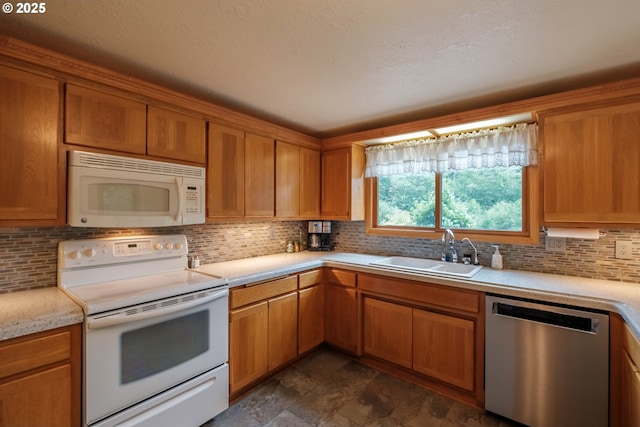 11874 Riverhaven Ln, Stayton, OR 97383 - kitchen featuring white appliances, a sink, tasteful backsplash, and light countertops