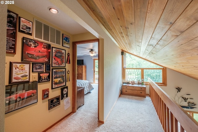 11874 Riverhaven Ln, Stayton, OR 97383 - corridor featuring carpet flooring, wooden ceiling, lofted ceiling, and baseboards
