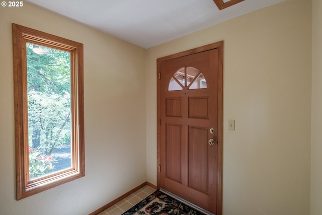 11874 Riverhaven Ln, Stayton, OR 97383 - entryway with baseboards and light tile patterned floors