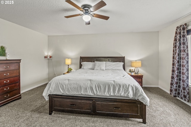 bedroom with a textured ceiling, ceiling fan, carpet, and baseboards