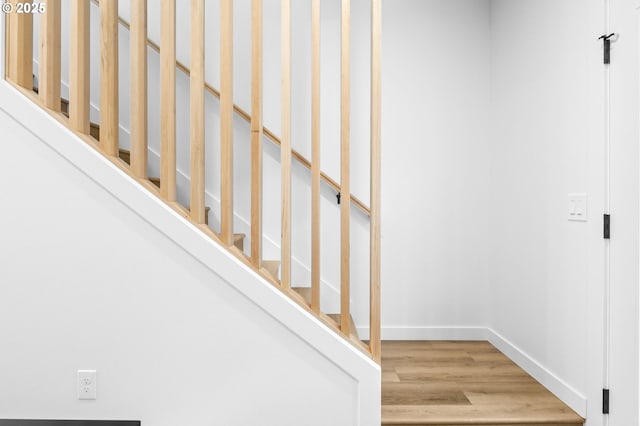 3530 NE 44th Ave, Portland, OR 97212 - staircase featuring wood finished floors and baseboards