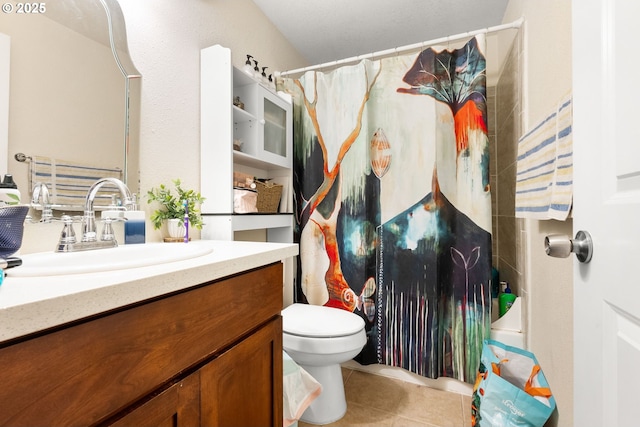 bathroom featuring tile patterned flooring, vanity, toilet, and shower / bath combo