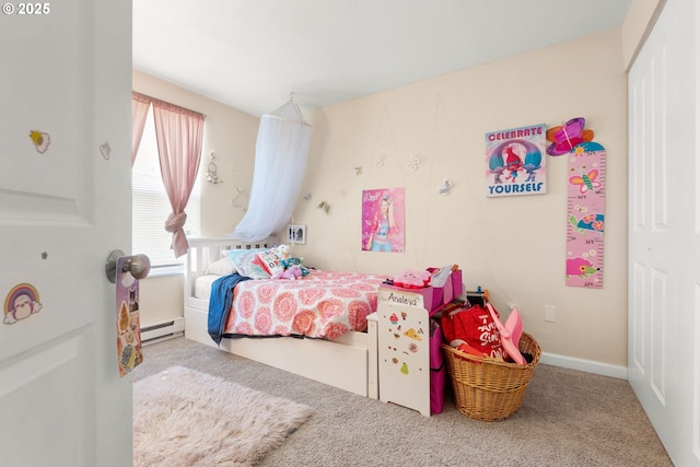 carpeted bedroom featuring a baseboard radiator