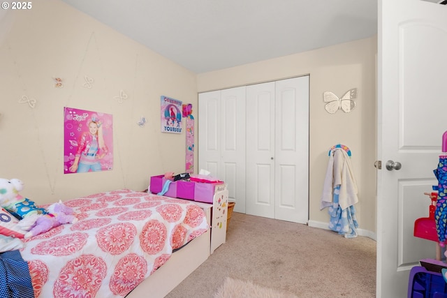 carpeted bedroom with a closet