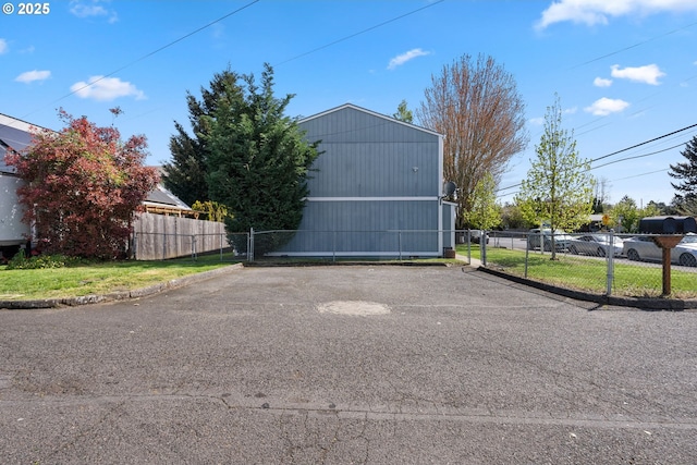 garage with fence