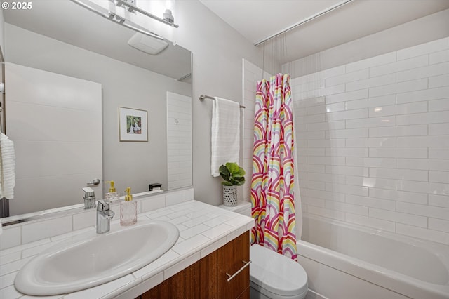 full bathroom with shower / bath combo, toilet, and vanity