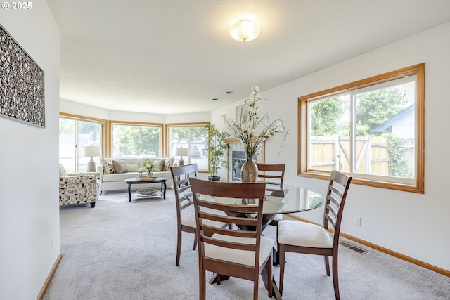 7324 B St, Springfield, OR 97478 - dining space with light colored carpet and plenty of natural light