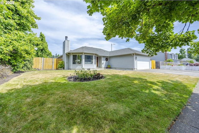 7324 B St, Springfield, OR 97478 - view of front of home featuring a chimney, driveway, and an attached garage