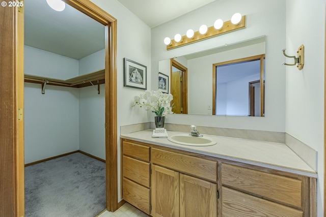 7324 B St, Springfield, OR 97478 - bathroom featuring vanity and a spacious closet