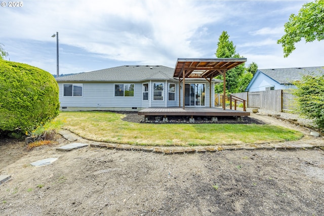 7324 B St, Springfield, OR 97478 - back of property featuring a wooden deck and crawl space