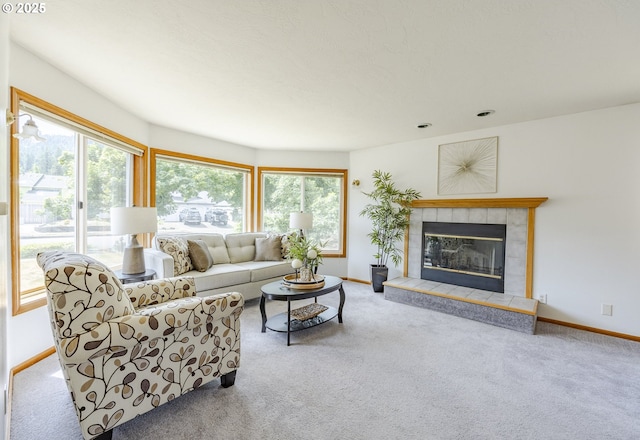 7324 B St, Springfield, OR 97478 - living room featuring carpet floors, plenty of natural light, and a tile fireplace