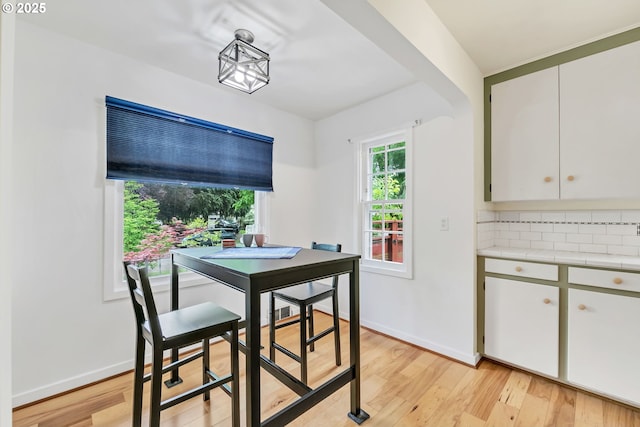 912 Van Buren St, Eugene, OR 97402 - dining space with light wood-style flooring and baseboards