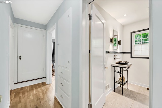 912 Van Buren St, Eugene, OR 97402 - corridor featuring baseboards and light wood finished floors