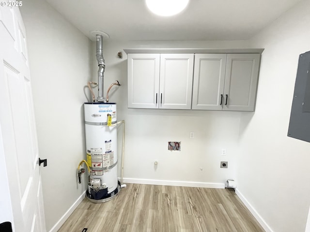 2660 Evergreen Ct, Salem, OR 97301 - washroom featuring water heater, hookup for an electric dryer, light wood-type flooring, hookup for a washing machine, and electric panel