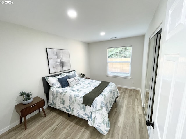 2660 Evergreen Ct, Salem, OR 97301 - bedroom with light wood-type flooring, recessed lighting, baseboards, and a closet