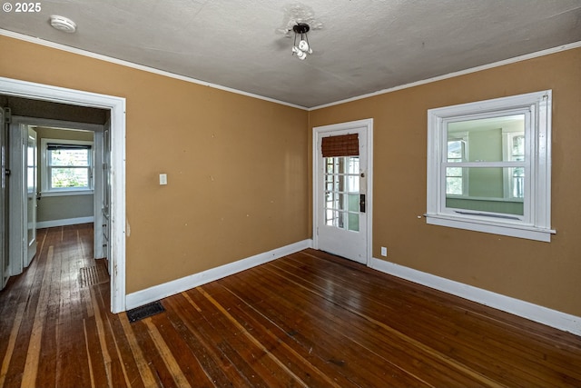3955 SE Kelly St, Portland, OR 97202 - spare room featuring ornamental molding, a smoke detector, and dark wood finished floors