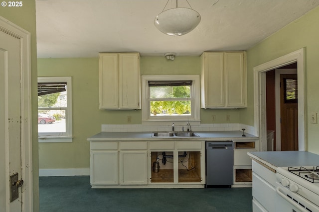 3955 SE Kelly St, Portland, OR 97202 - kitchen with stainless steel dishwasher, light countertops, and white range with gas stovetop