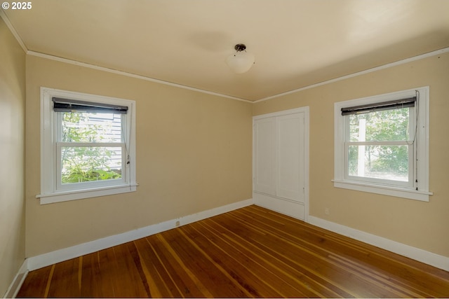 3955 SE Kelly St, Portland, OR 97202 - unfurnished room with crown molding and dark wood-style flooring