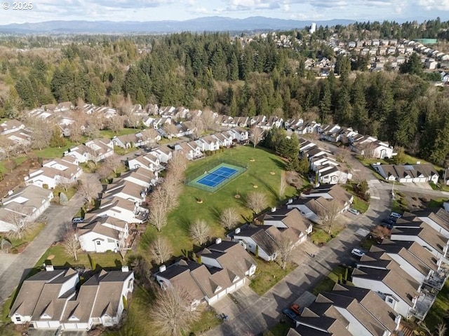 aerial view with a forest view and a residential view