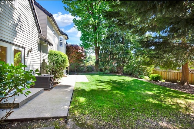 14559 SE Megan Way, Clackamas, OR 97015 - view of yard featuring a patio area and central AC