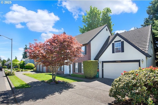 view of front facade with driveway and a garage
