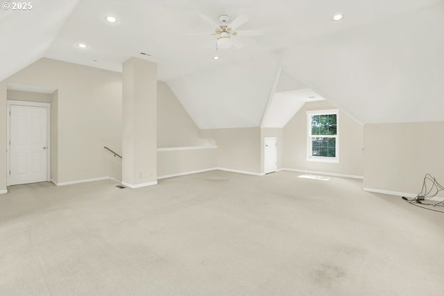 bonus room featuring baseboards, vaulted ceiling, light colored carpet, recessed lighting, and ceiling fan