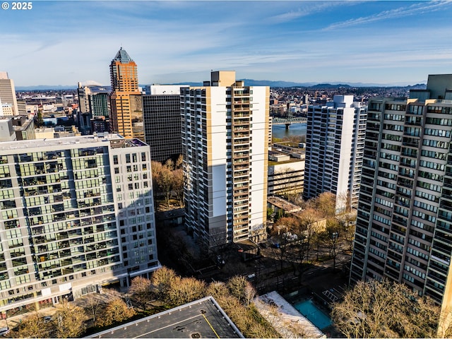 property's view of city with a water view