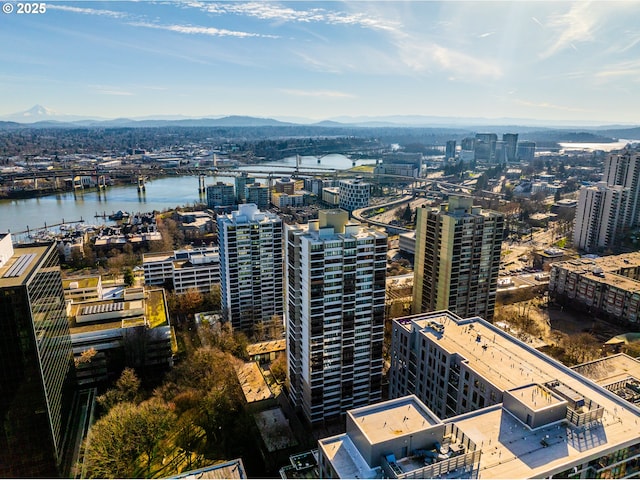 view of city featuring a water and mountain view