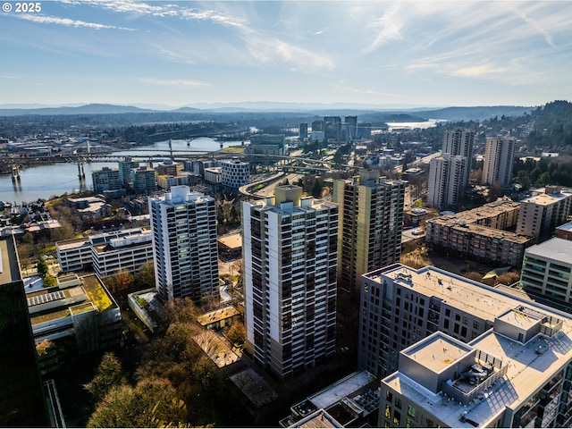 city view featuring a water and mountain view