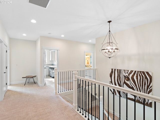 9010 SW Inez St, Tigard, OR 97224 - corridor with an upstairs landing, a chandelier, recessed lighting, baseboards, and carpet flooring