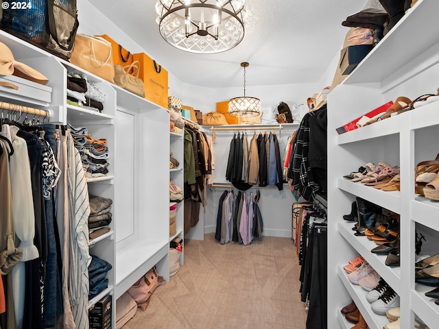 9010 SW Inez St, Tigard, OR 97224 - walk in closet with a chandelier and light colored carpet