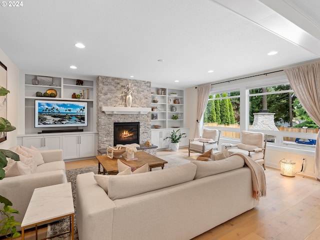 9010 SW Inez St, Tigard, OR 97224 - living area featuring light wood-type flooring, a fireplace, recessed lighting, and built in features