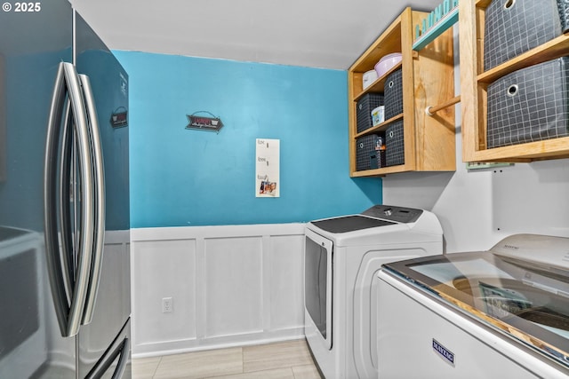 washroom featuring separate washer and dryer