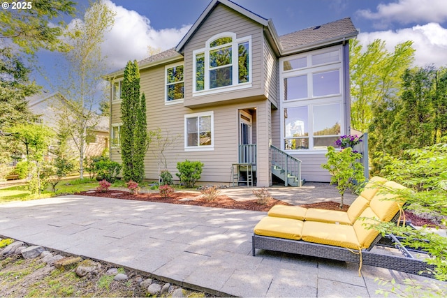 back of house featuring a patio area