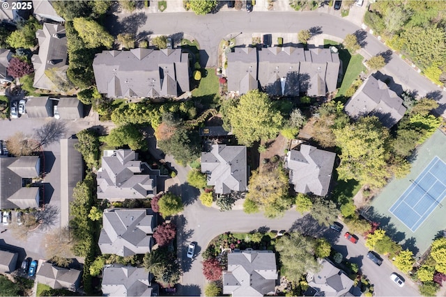 aerial view of property's location with nearby suburban area